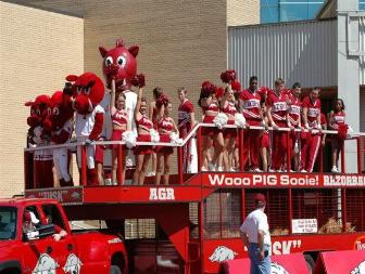 Razorback cheerleaders know that no pep rally or gameday is complete without a series of "Woo, Pig, Sooie" hog calls
