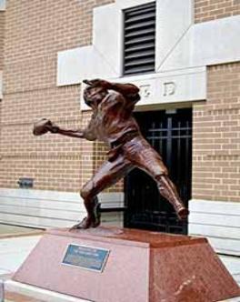 Doug Flutie Statue Flutie's last-second pass to defeat Miami in 1984 is immortalized through this statue that was placed outside of BC's Alumni Stadium